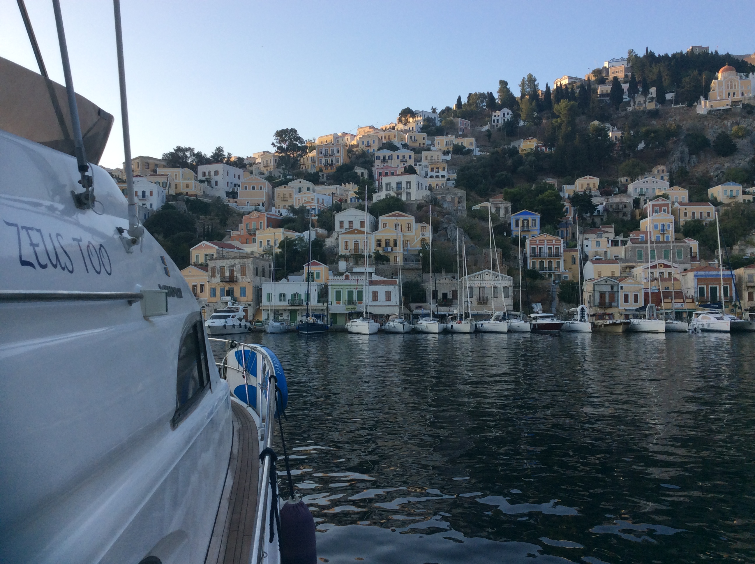 Zeus Too laying anchor at Symi Harbour